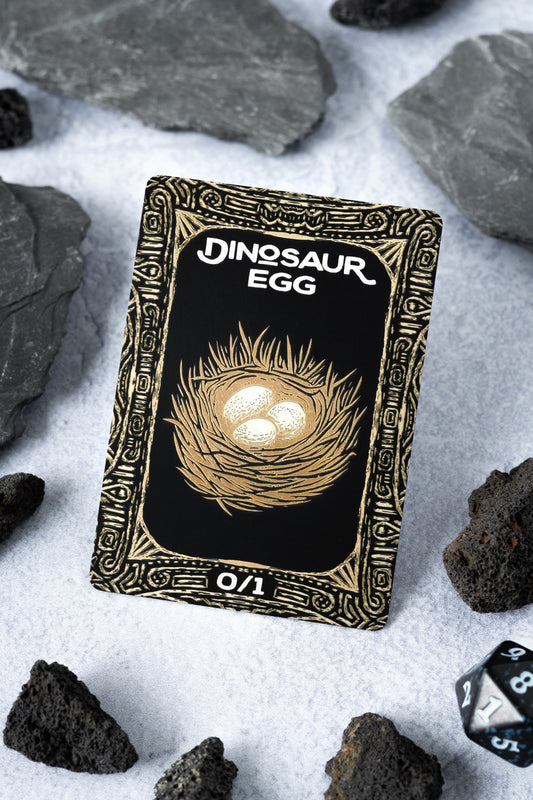 Engraved Steel Dinosaur Egg Token - Legendary Artifacts